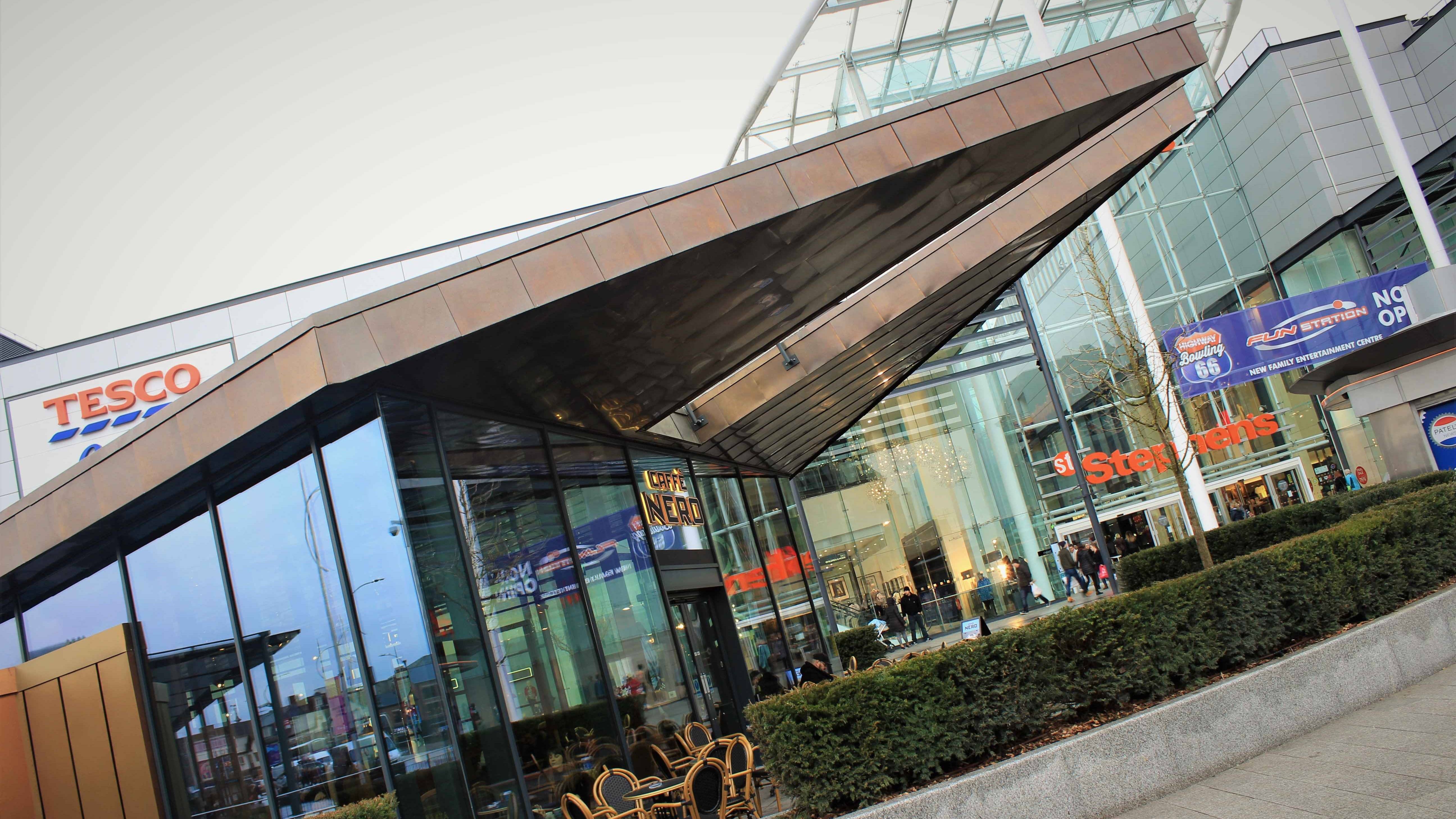 Caffe Nero Hull Longworth Brass Cladding