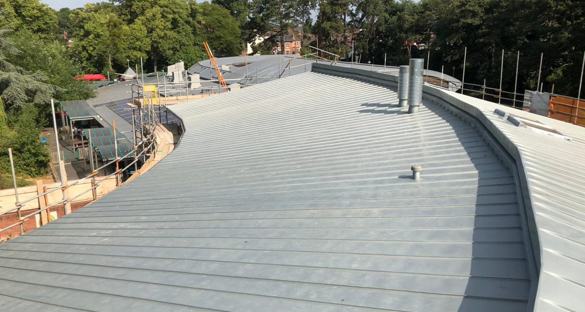 9. Red Hill Primary Longworth tight roof curve and tapered zinc panels with penetrations